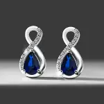 0,57 Karat Pırlantalı Safir Küpe