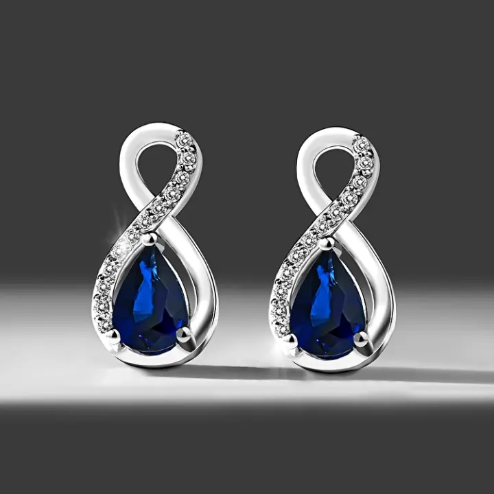 0,57 Karat Pırlantalı Safir Küpe